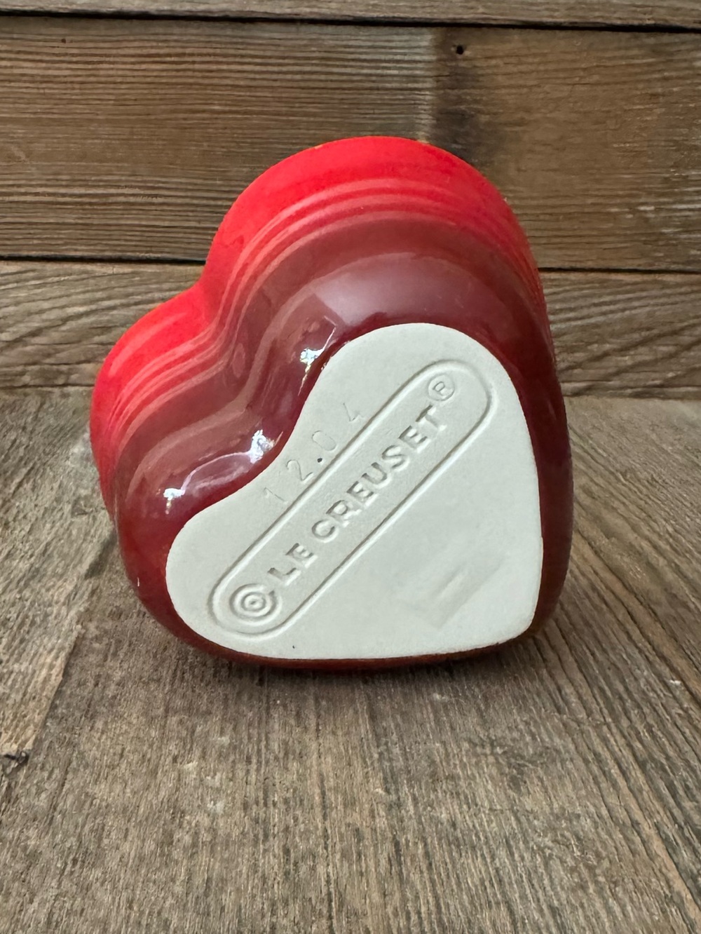 Red Le Creuset heart-shaped stoneware ramekin